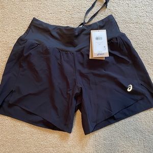 Women’s Asics Black 5.5 inch shorts size small.